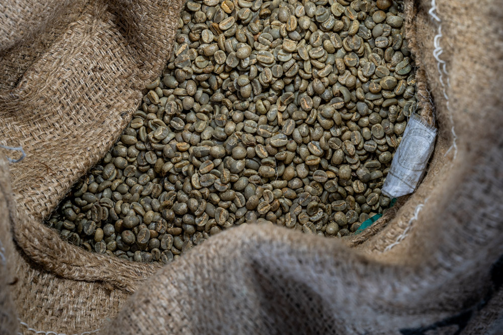 Green  coffee beans in a sack